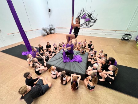 Students in a dance class at Simone's School of Performing Arts improve coordination and balance. Dance classes for kids help develop essential motor skills in a fun and supportive environment.