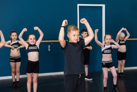 Students at Simone's School of Performing Arts enjoying an after-school dance class, showcasing why dance is the perfect activity for kids by enhancing fitness, confidence, and creativity.